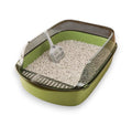 Green plastic cat litter box with a clear domed hood, filled with light-colored litter, and a gray scoop inside.